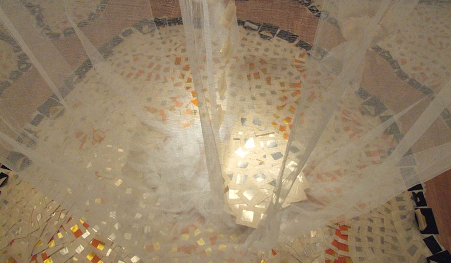 View into an art installation made from sheer material 