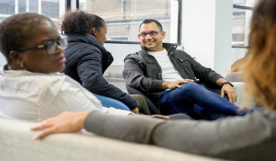 A group of postgraduate students interacting