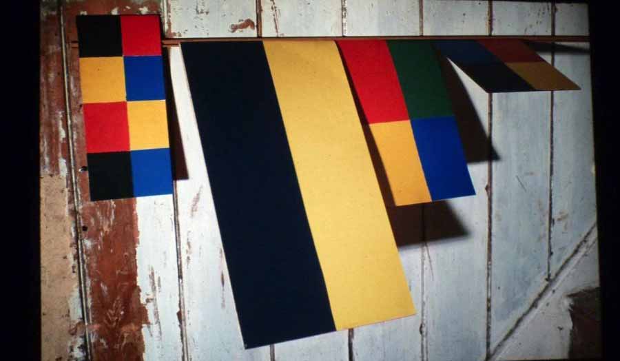 Coloured shapes on wooden structure
