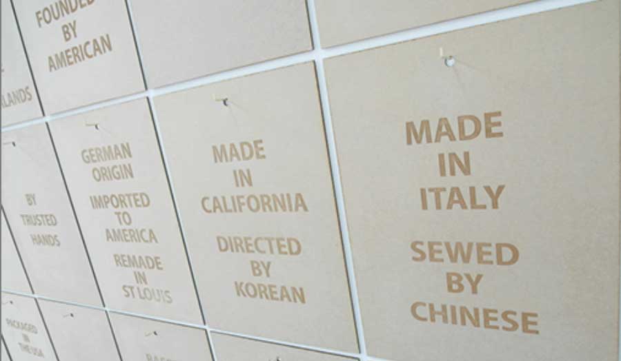 Wessie Ling – Labels of Desire with wording such as "Made in Italy Sewed by Chinese"