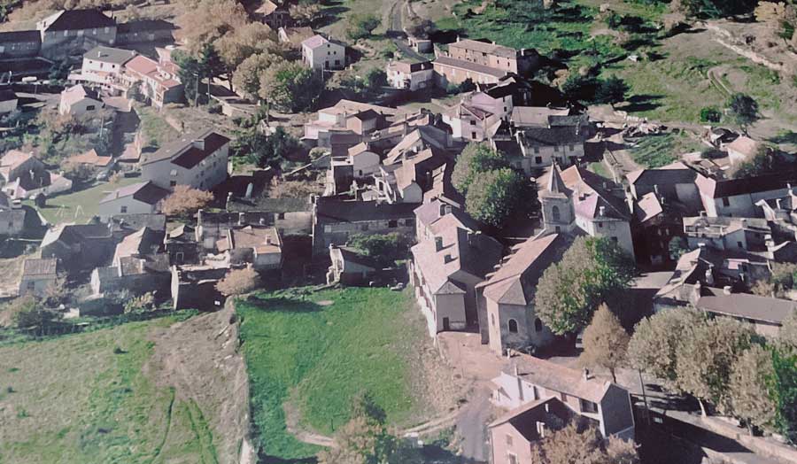 Aerial photo of hill town buildings