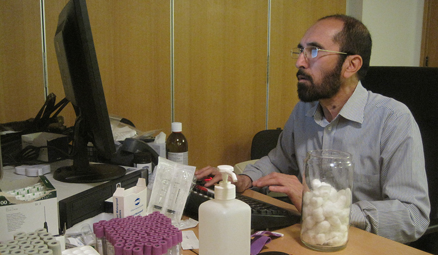 A man working at a desk.