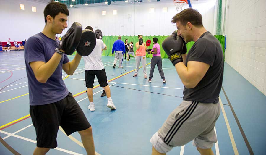 Men participating in a boxfit class