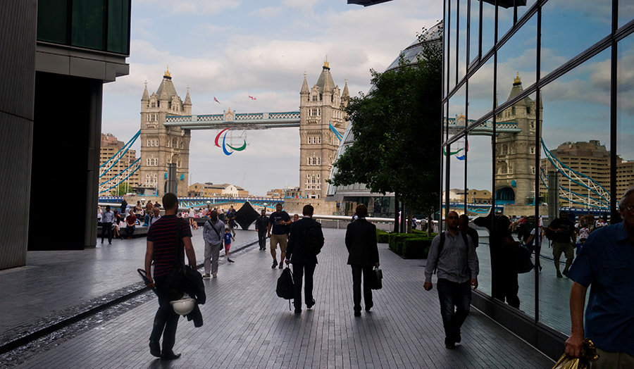 A view of Tower Bridge between two buildings