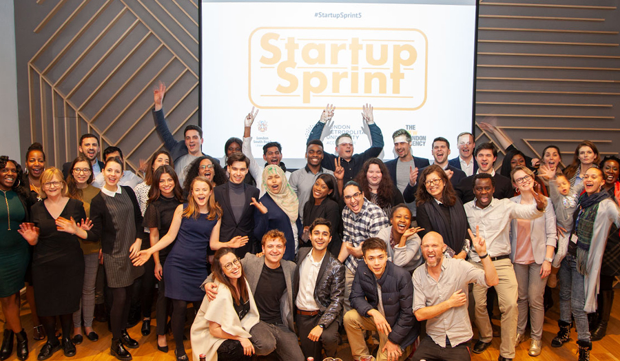 Group of people celebrating the Startup Sprint Event at Accelerator
