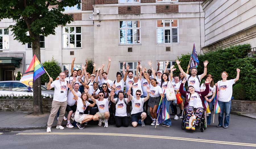 A group of students and staff celebrating pride