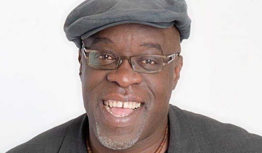 Profile picture of Kwame McPherson wearing a cap