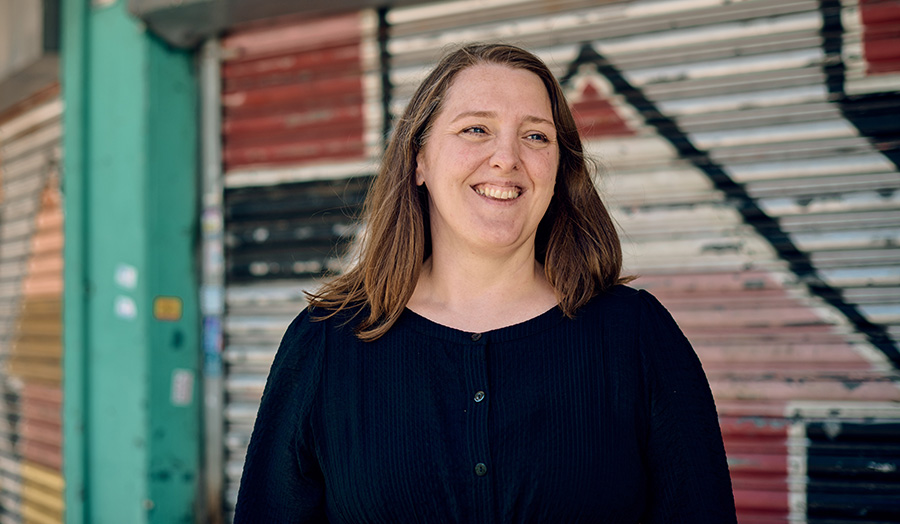 Kelly Cooper, Dean of the School of Social Sciences and Professions, smiling