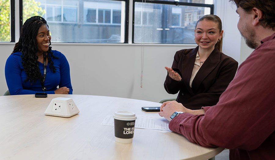 Iulia chatting to her lecturer Maxine