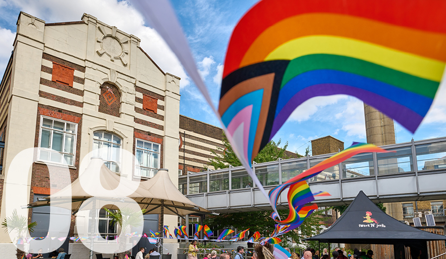Courtyard at London Met displaying LGBTQIA+ flag at event