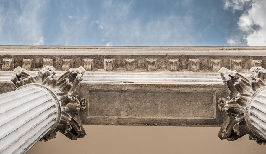 Columns details with sky in background