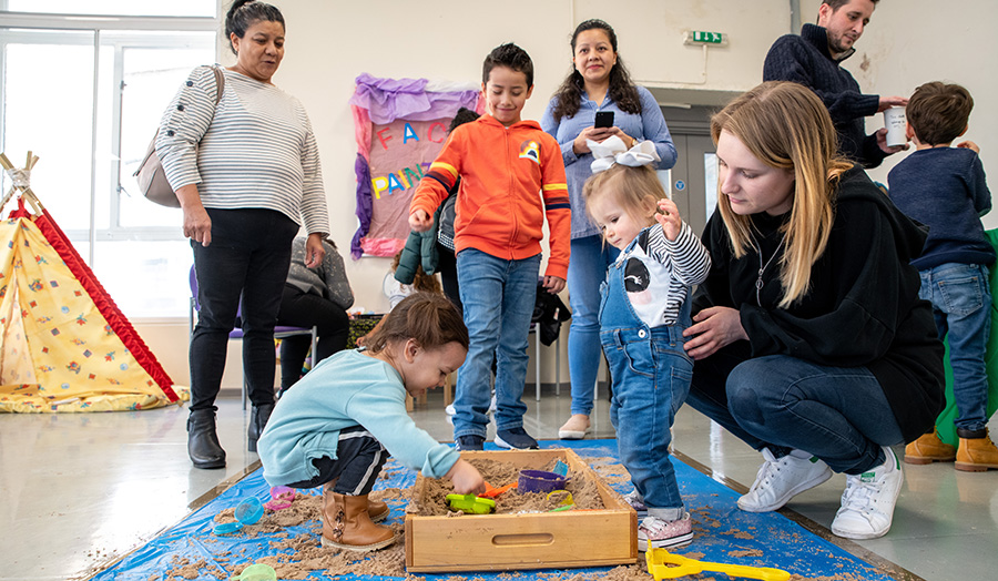 Parents and children playing