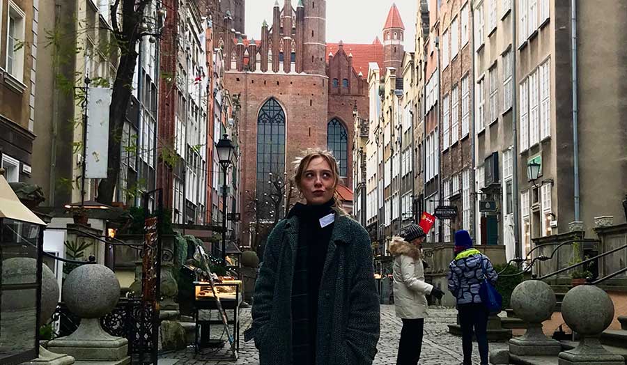 Student ambassador, Hailey, in a European city