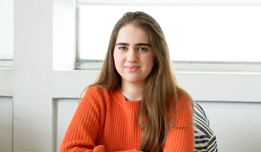 A photo of female student Tarina Ako smiling to camera.