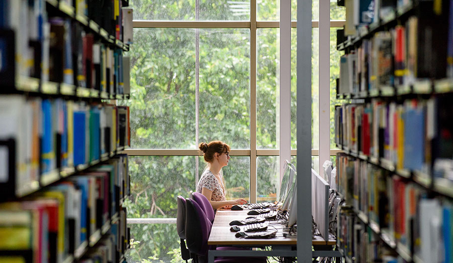 Student sitting in library