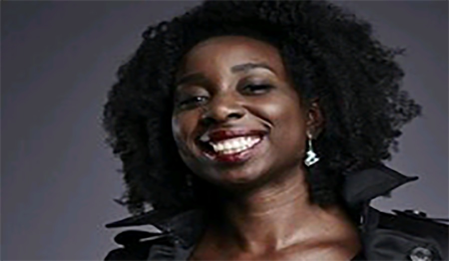 Destiny Ekaragha, a London Met film graduate, smiling headshot