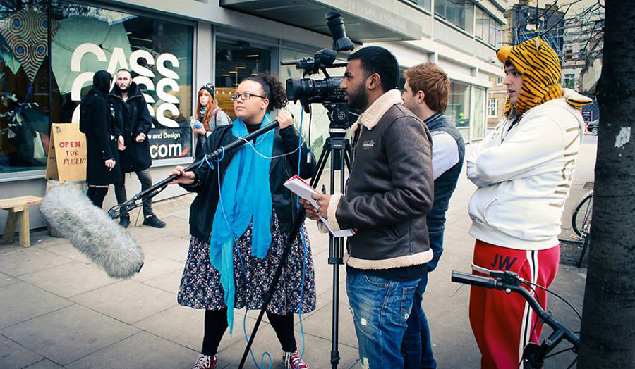 Film production students filming in front of the Cass faculty