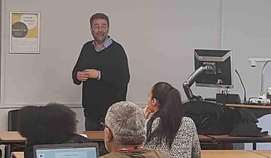 Dr Andrew Moran delivering a lecture to students