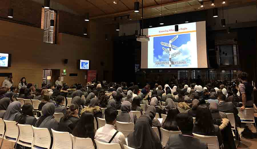 A-level students listening to one of the speakers in the Wash Houses