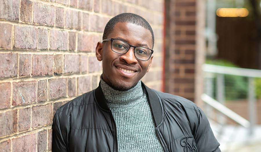 A portrait photograph of Eric Konadu