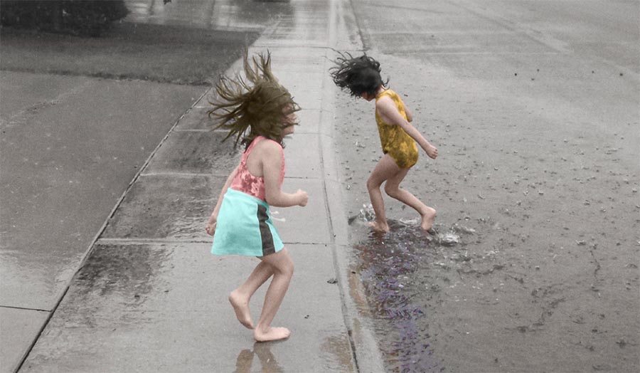 Two young children playing in the street - promotion shot for the show.