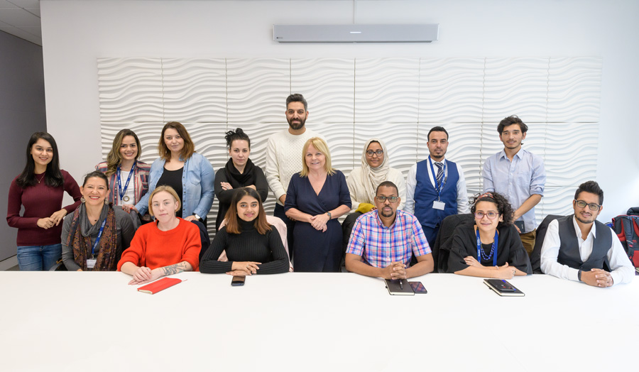 A group photo of all the new international scholars, including Vice-Chancellor Lynn Dobbs