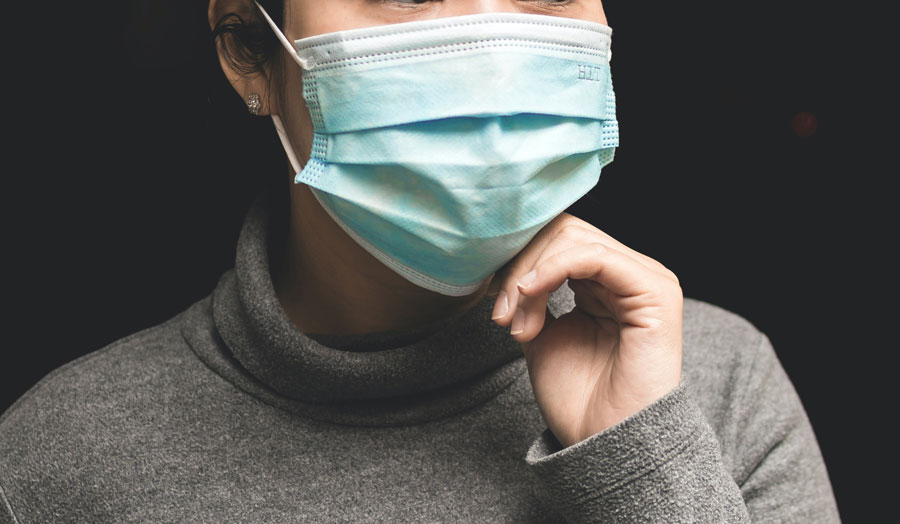 woman wearing a medical mask