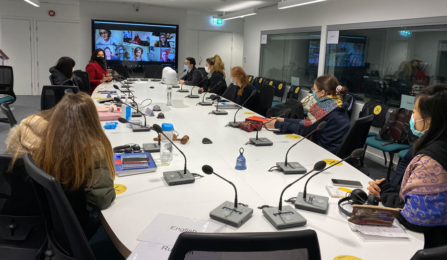 students in an interpreting conference room