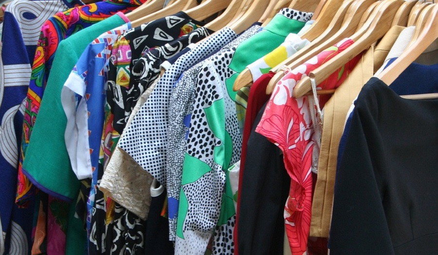 colourful dresses hanging on a rail