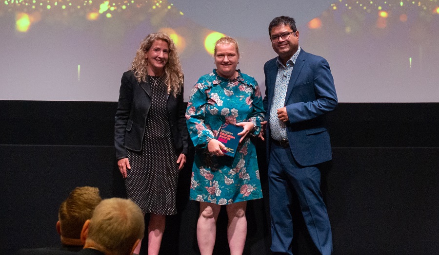 Sophie Cloutterbuck, Katerina Jedlickova and Paul Sinha with award