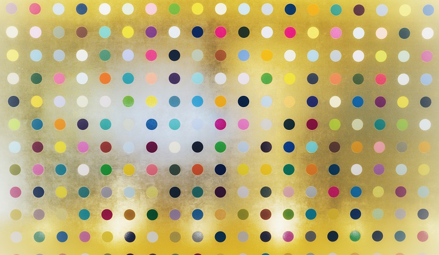 multi-coloured dots against a yellow background