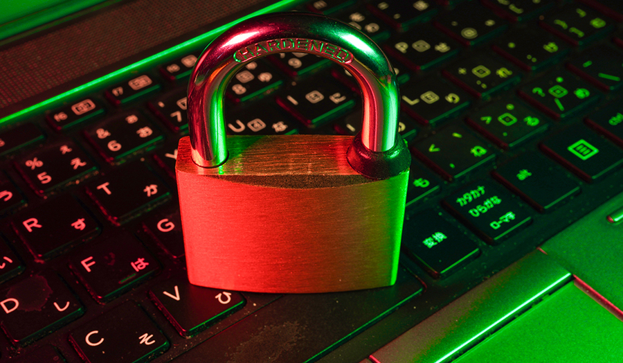 A padlock on a keyboard