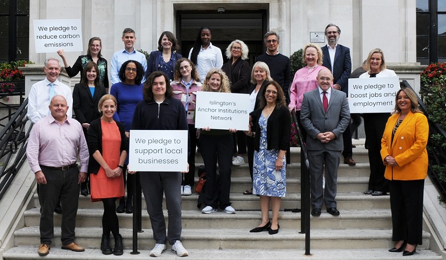 Representatives of Islington's Anchor Institution Network standing on the Town Hall steps