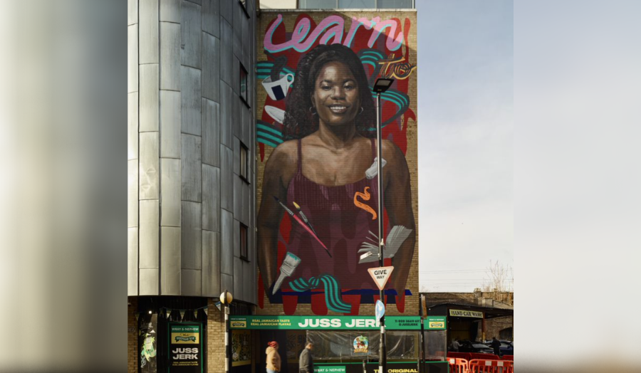 Learn to Dream Mural on the side of London Met's building opposite the Emirates Stadium