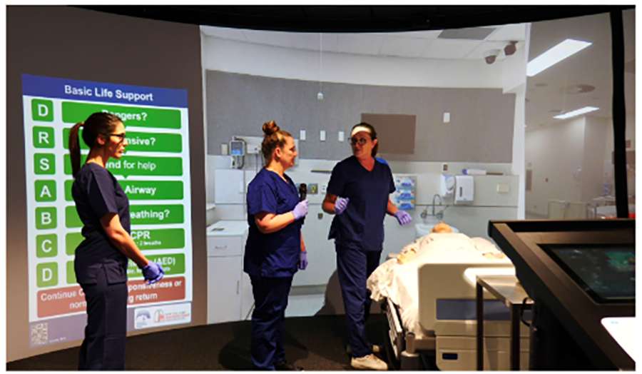 A group of nurses in an immersive training room
