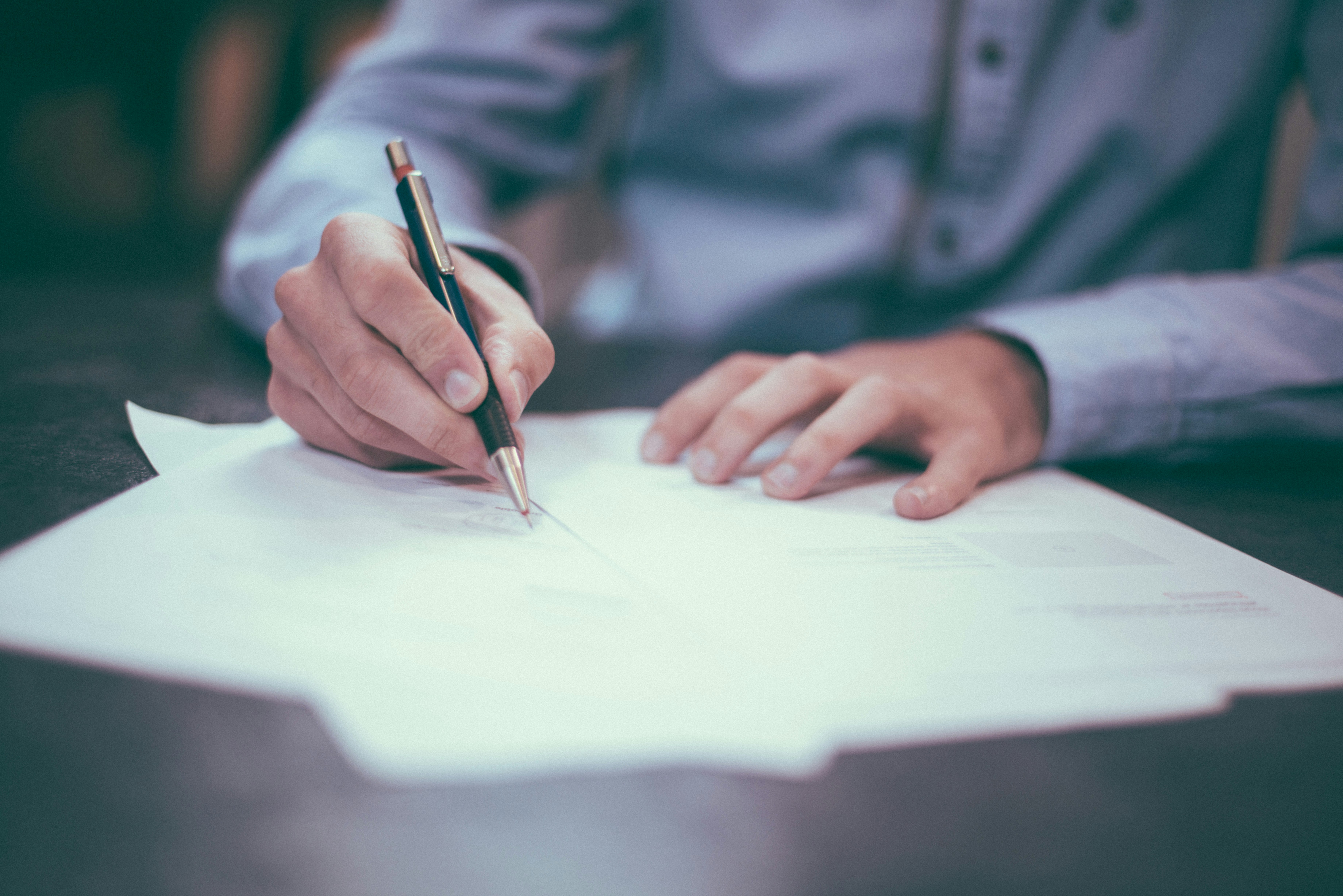 A man writing a report