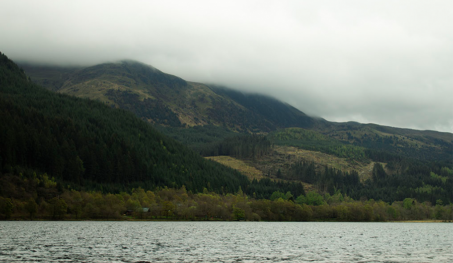 A landscape photo of mountains and water