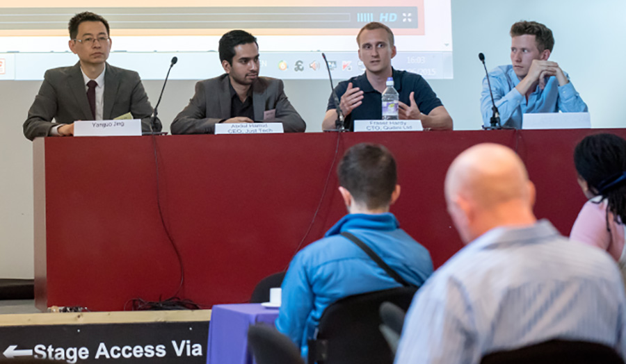 Professors at the University sit on a panel discussion