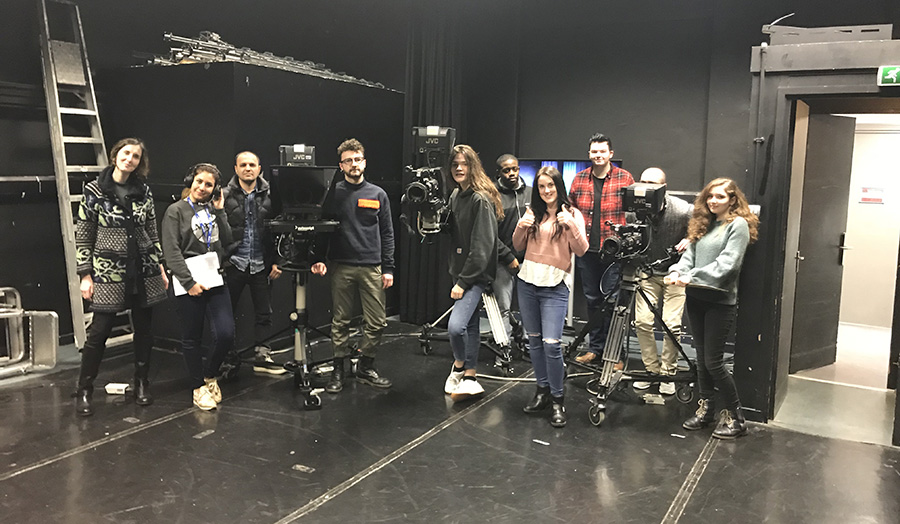 Group photo in a studio of Film and Broadcast students