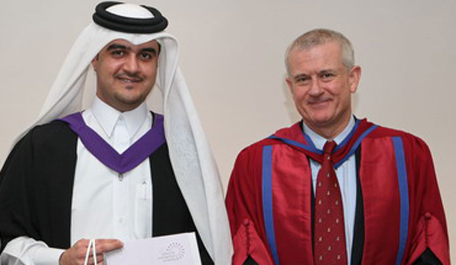 Vice-Chancellor of London Met Professor Malcolm Gillies with a graduate from the programme