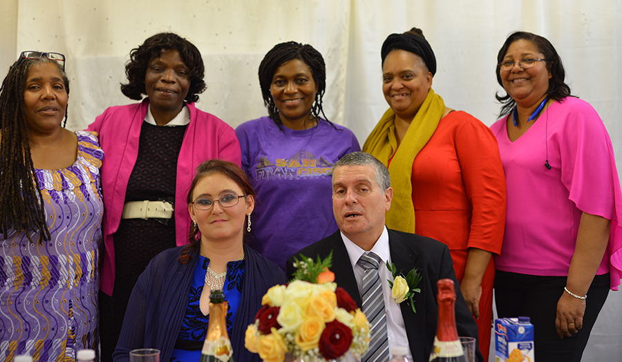 Sarah Lubanga (pink cardigan) a health and social care student, often works with charities outside her studies.