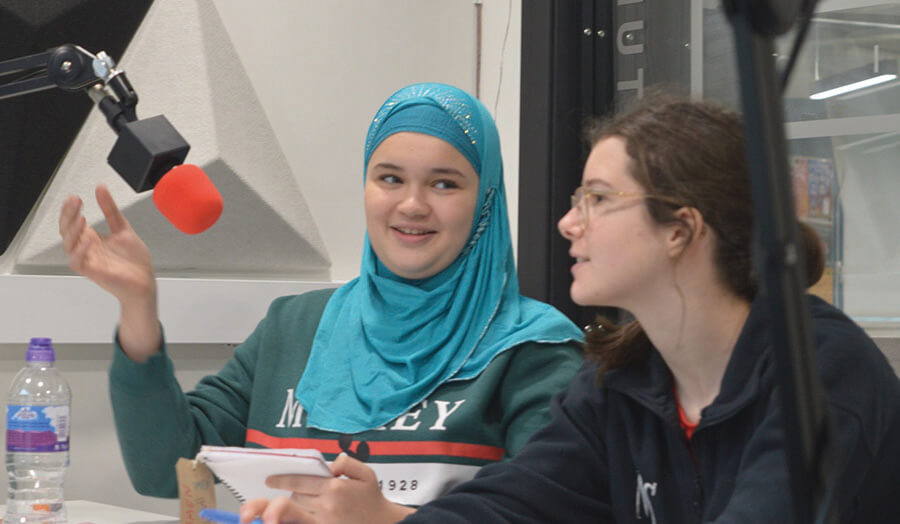 Two students at Verve Radio station