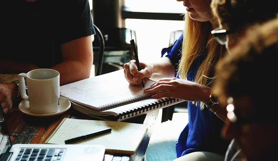 People around a table in collaborative work