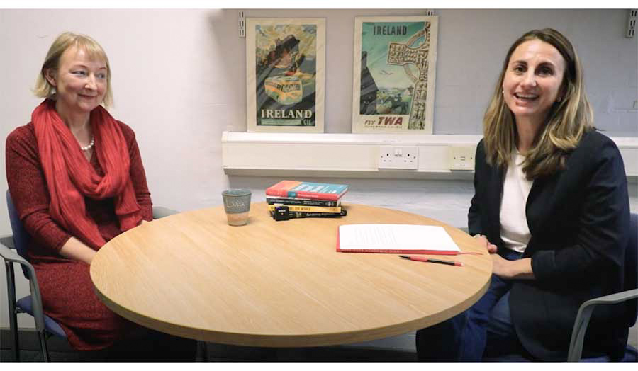 Prof. Louise Ryan (on the left) and Dr Maria Lopez (on the right) sitting at the table chatting