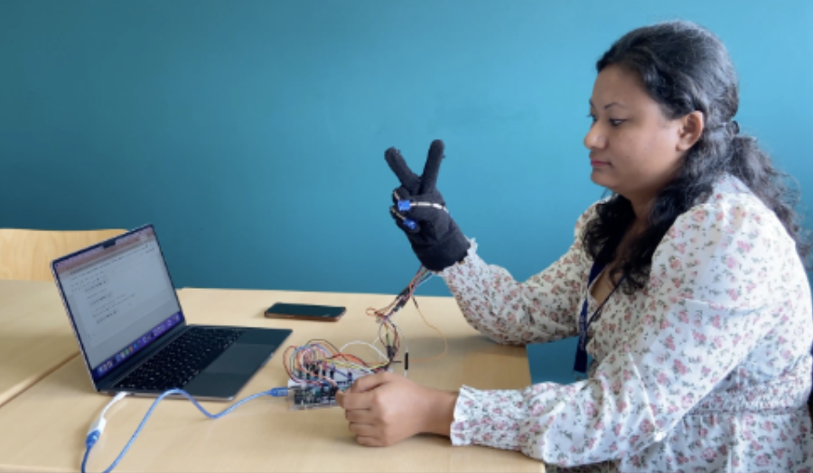 Sunila Maharjan working on the Smart Glove device.