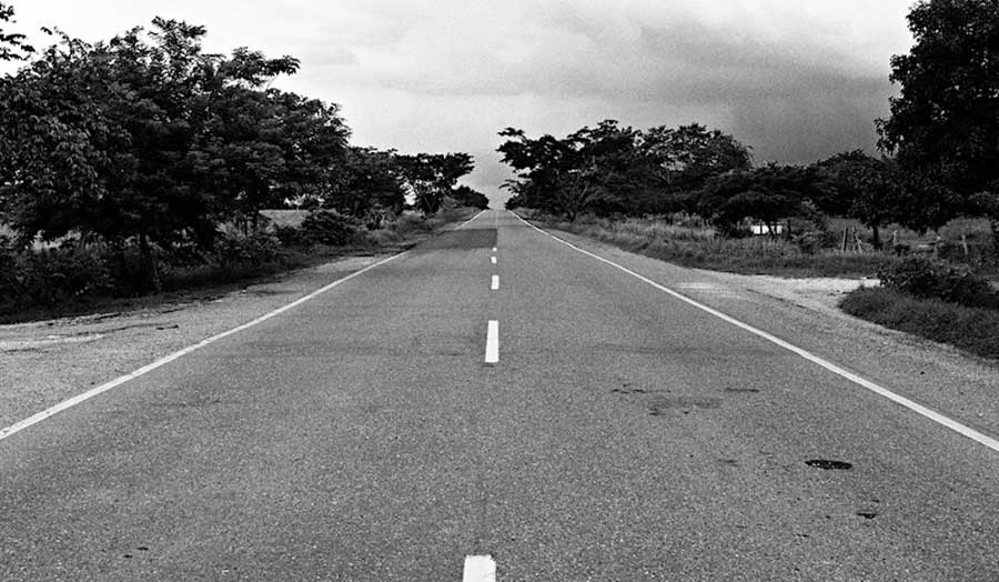 An empty road leading ahead