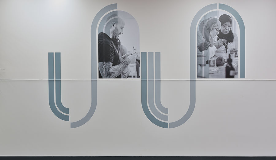A wall showing images of nursing