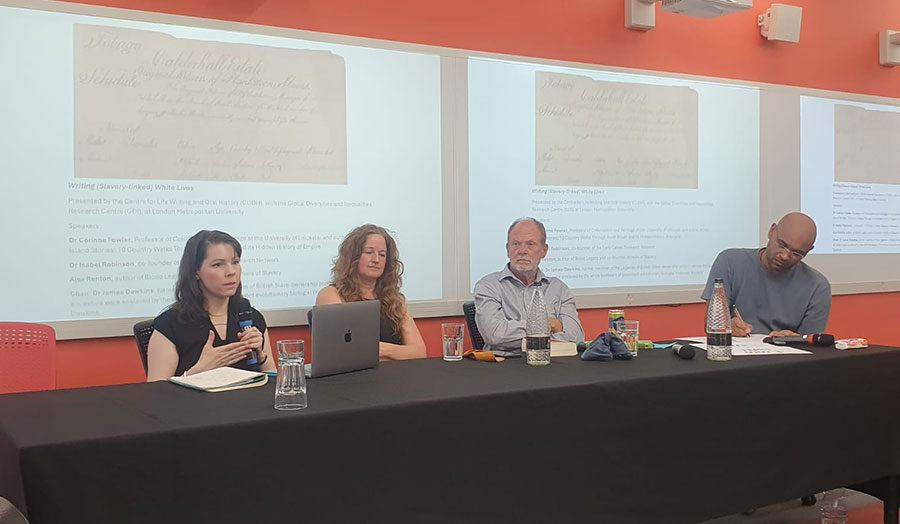 Four people in discussion at an event