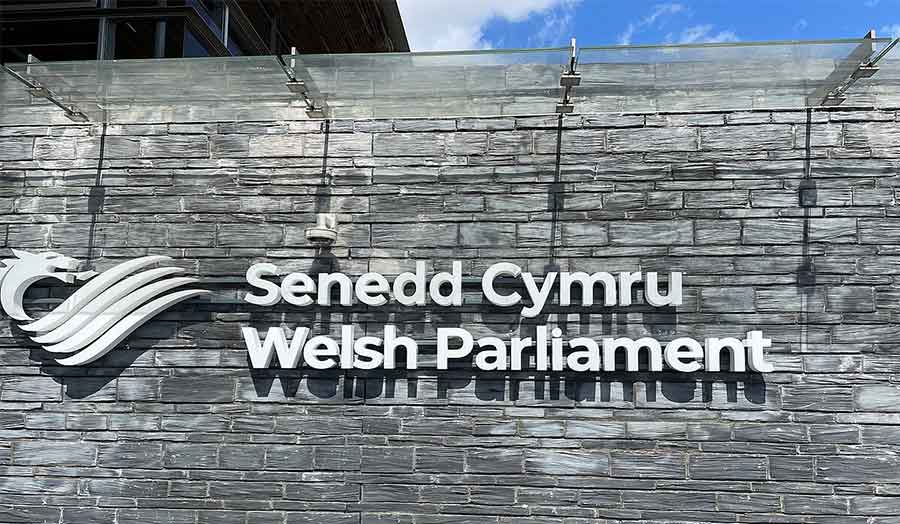A sign outside the Senedd Cymru - Welsh Parliament - building