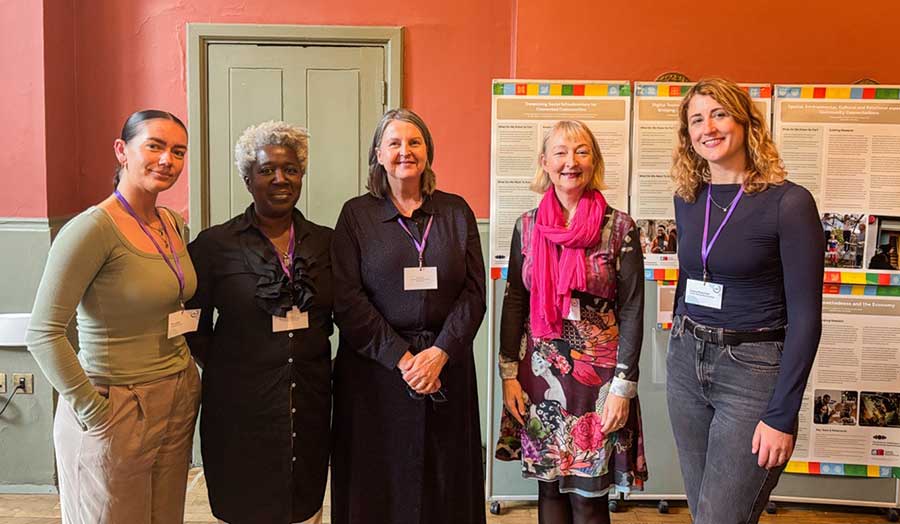 A group of people smiling